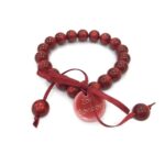 Pulsera 1 Marca zoe Bombón .
Rojo granate.