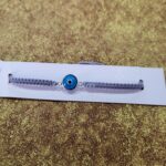 Pulsera macrame gris perla
ojo turco