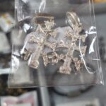 cruz de caravana
plata