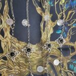 Pulsera triple protección 
plata.